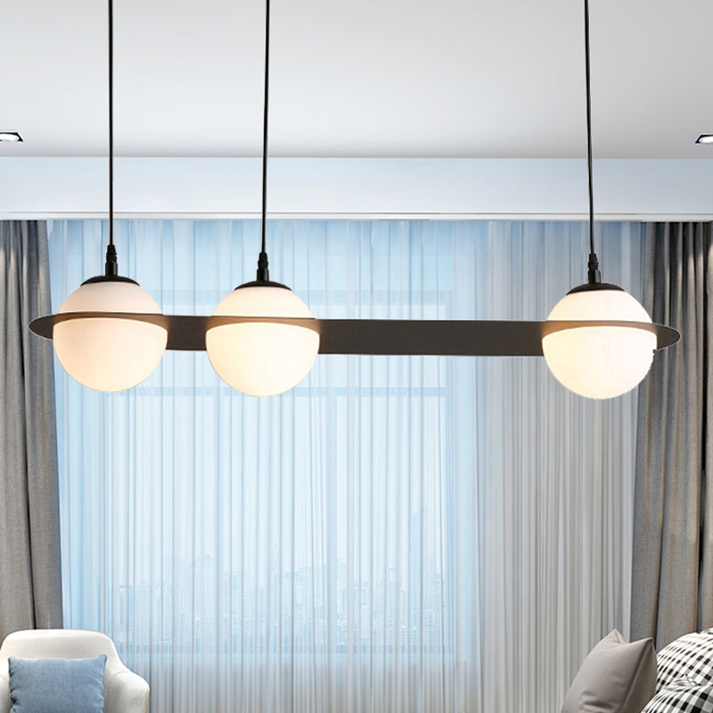 Ball White Glass Cluster Pendant with Straight/Curved Design Modernist 2/3 Lights Black Led Hanging Lamp 3 Black Straight Clearhalo 'Ceiling Lights' 'Glass shade' 'Glass' 'Modern Pendants' 'Modern' 'Pendant Lights' 'Pendants' Lighting' 244473