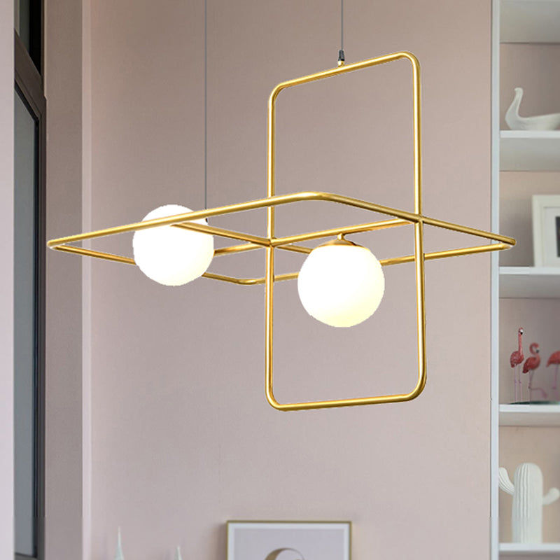 Crossed Rectangle Hanging Light with Globe Glass Shade Contemporary Metal 2/3/4 Heads Chandelier Light for Study Room 2 Gold Clearhalo 'Ceiling Lights' 'Chandeliers' 'Modern Chandeliers' 'Modern' Lighting' 245598