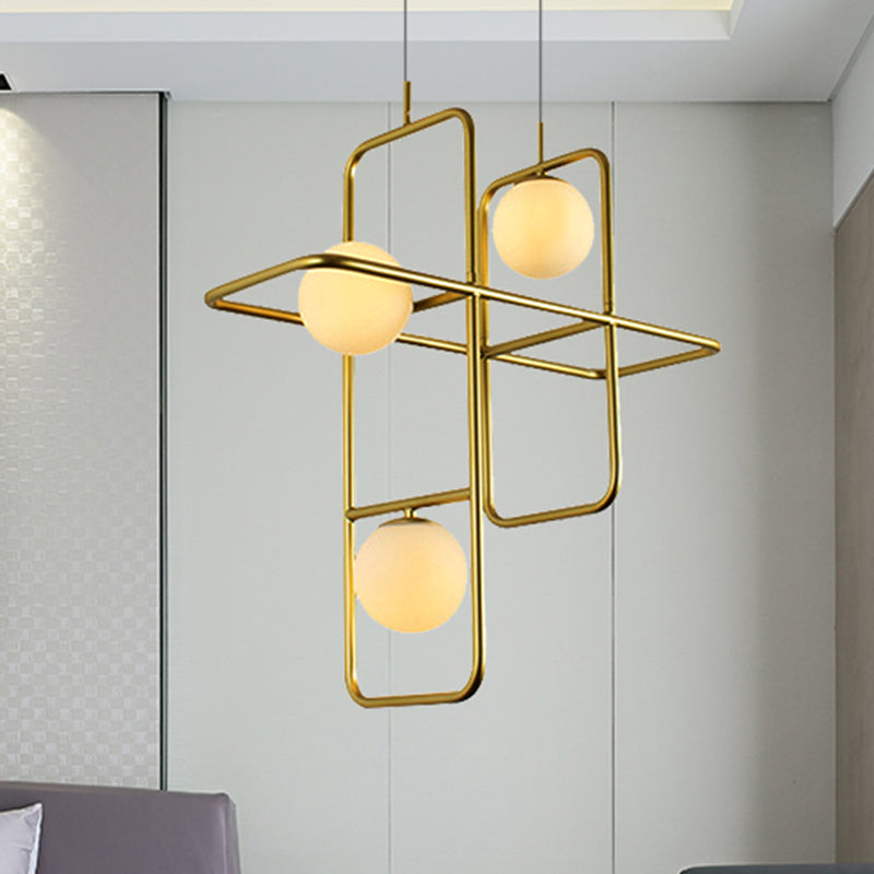 Crossed Rectangle Hanging Light with Globe Glass Shade Contemporary Metal 2/3/4 Heads Chandelier Light for Study Room 3 Gold Clearhalo 'Ceiling Lights' 'Chandeliers' 'Modern Chandeliers' 'Modern' Lighting' 245600