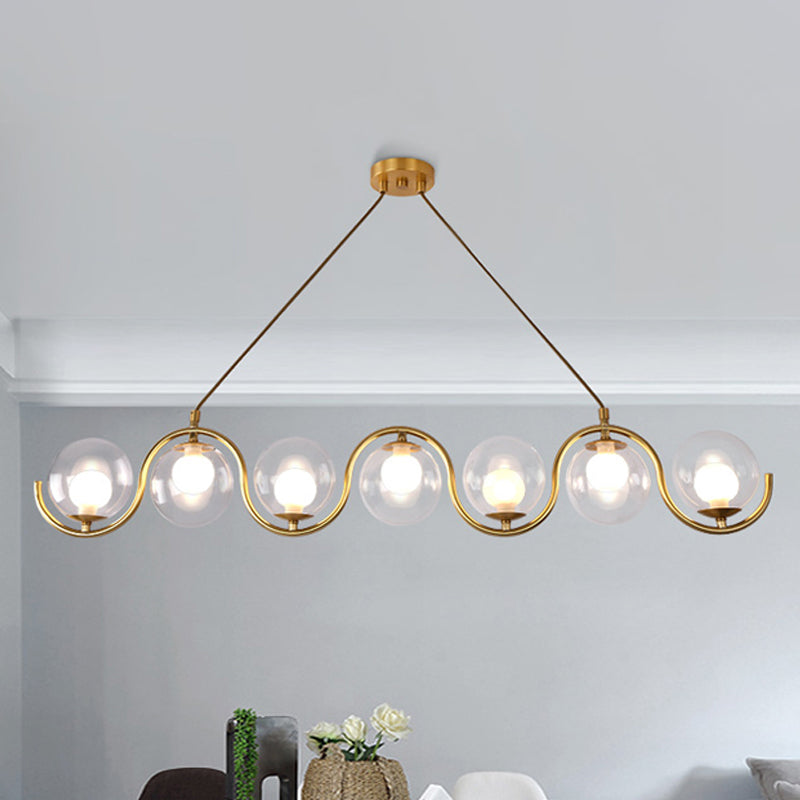 3/5/7 Lights Living Room Chandelier with Ball Clear Glass Shade Post Modernist Gold Led Hanging Ceiling Light 7 Gold Clearhalo 'Ceiling Lights' 'Chandeliers' 'Glass shade' 'Glass' 'Modern Chandeliers' 'Modern' Lighting' 245625