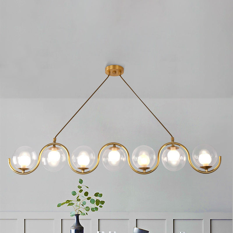 3/5/7 Lights Living Room Chandelier with Ball Clear Glass Shade Post Modernist Gold Led Hanging Ceiling Light Clearhalo 'Ceiling Lights' 'Chandeliers' 'Glass shade' 'Glass' 'Modern Chandeliers' 'Modern' Lighting' 245626