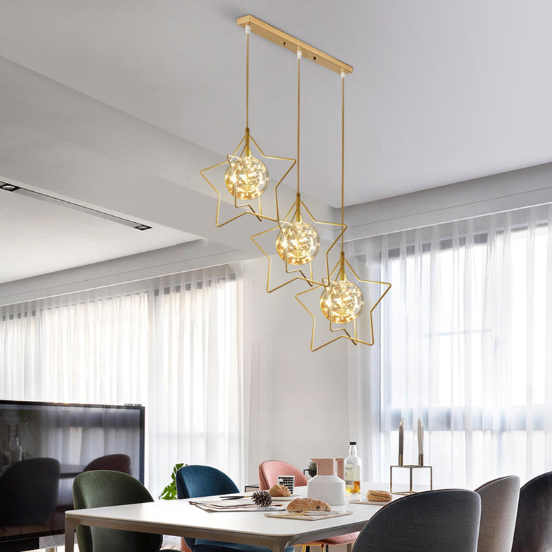 Gold Star and Ball Cluster Pendant Designer 3 Heads Clear Glass LED Hanging Light for Restaurant Clearhalo 'Ceiling Lights' 'Modern Pendants' 'Modern' 'Pendant Lights' 'Pendants' Lighting' 2460072