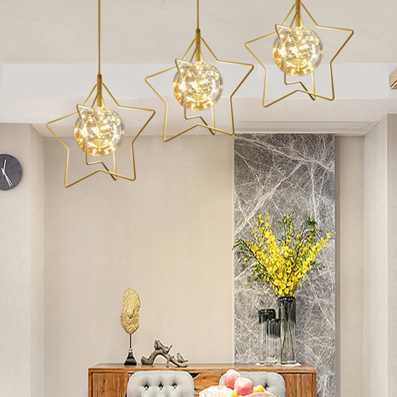 Gold Star and Ball Cluster Pendant Designer 3 Heads Clear Glass LED Hanging Light for Restaurant Clearhalo 'Ceiling Lights' 'Modern Pendants' 'Modern' 'Pendant Lights' 'Pendants' Lighting' 2460075