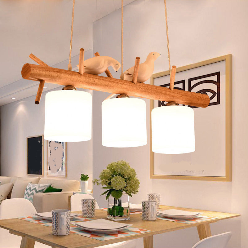Opal Glass Cylinder Pendant Light Nordic Wood Island Light with Resin Bird Decor Clearhalo 'Ceiling Lights' 'Island Lights' Lighting' 2460557
