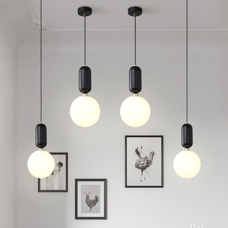 Milky Glass Ball Suspension Lamp Simplicity 1-Bulb Pendant Lighting Fixture for Living Room Clearhalo 'Ceiling Lights' 'Glass shade' 'Glass' 'Modern Pendants' 'Modern' 'Pendant Lights' 'Pendants' Lighting' 2460593