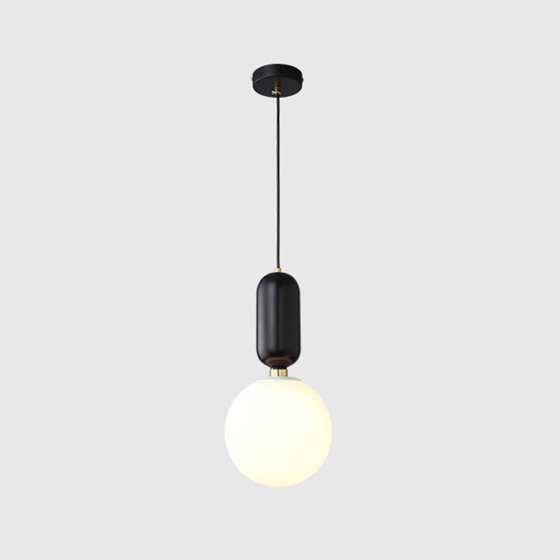 Milky Glass Ball Suspension Lamp Simplicity 1-Bulb Pendant Lighting Fixture for Living Room Black 8" Clearhalo 'Ceiling Lights' 'Glass shade' 'Glass' 'Modern Pendants' 'Modern' 'Pendant Lights' 'Pendants' Lighting' 2460609