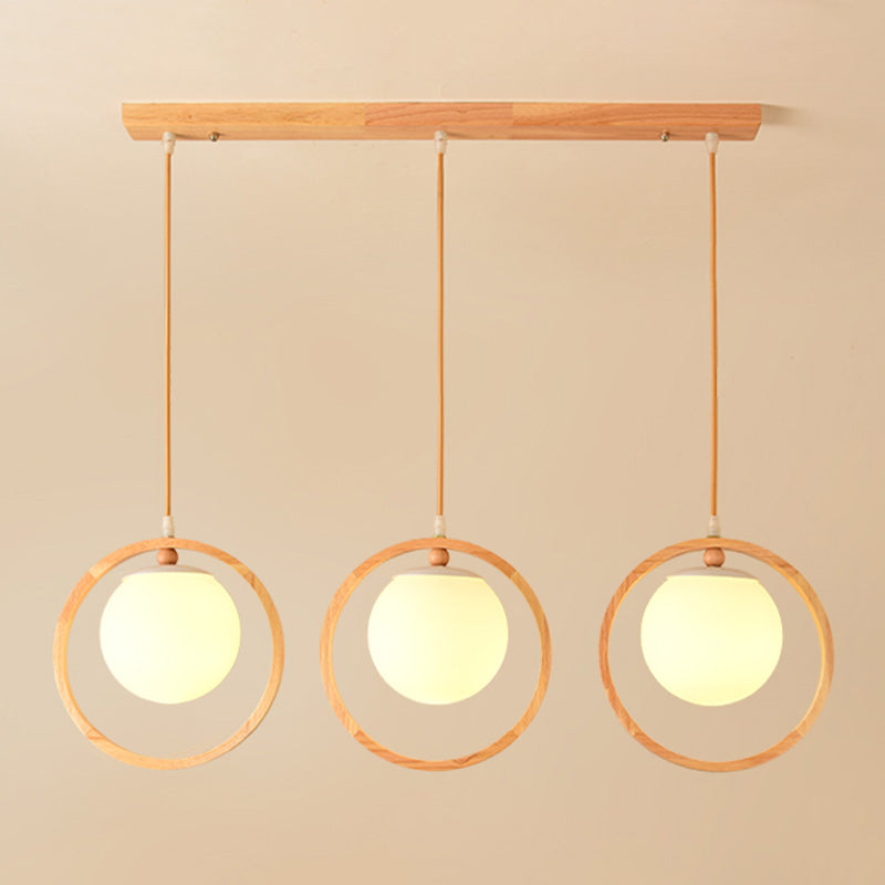 Opaline Glass Ball Cluster Pendant Nordic Style Beige Hanging Light Fixture with Wooden Ring 3 Wood Clearhalo 'Ceiling Lights' 'Modern Pendants' 'Modern' 'Pendant Lights' 'Pendants' Lighting' 2461633