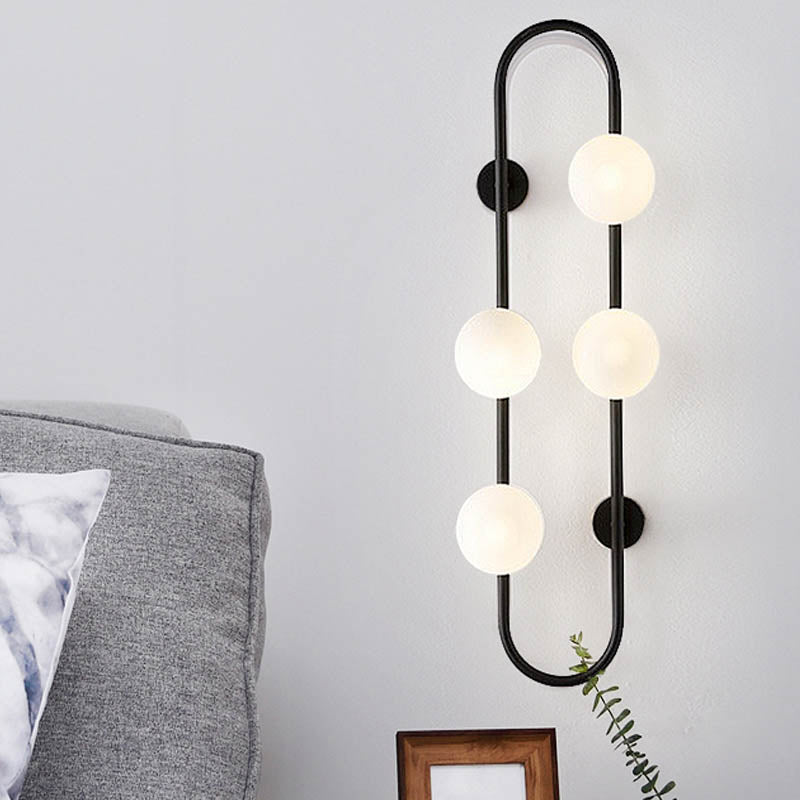 Modern Globe Wall Sconce Matte White Glass 4-Light Bedroom Wall Lighting Ideas in Black/Gold with Oblong Hanging Rod Clearhalo 'Cast Iron' 'Glass' 'Industrial' 'Modern wall lights' 'Modern' 'Tiffany' 'Traditional wall lights' 'Wall Lamps & Sconces' 'Wall Lights' Lighting' 246264
