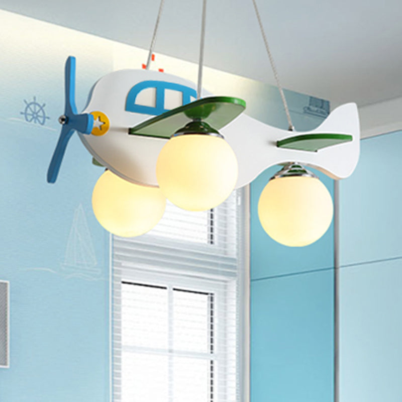 Cartoon Aircraft Pendant Chandelier Wooden 3-Bulb Kids Room Hanging Light with Ball White Glass Shade Green-White Clearhalo 'Ceiling Lights' 'Pendant Lights' 'Pendants' Lighting' 2463013