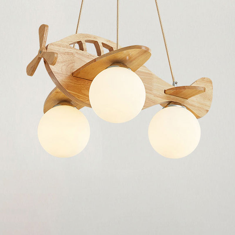 Cartoon Aircraft Pendant Chandelier Wooden 3-Bulb Kids Room Hanging Light with Ball White Glass Shade Clearhalo 'Ceiling Lights' 'Pendant Lights' 'Pendants' Lighting' 2463014