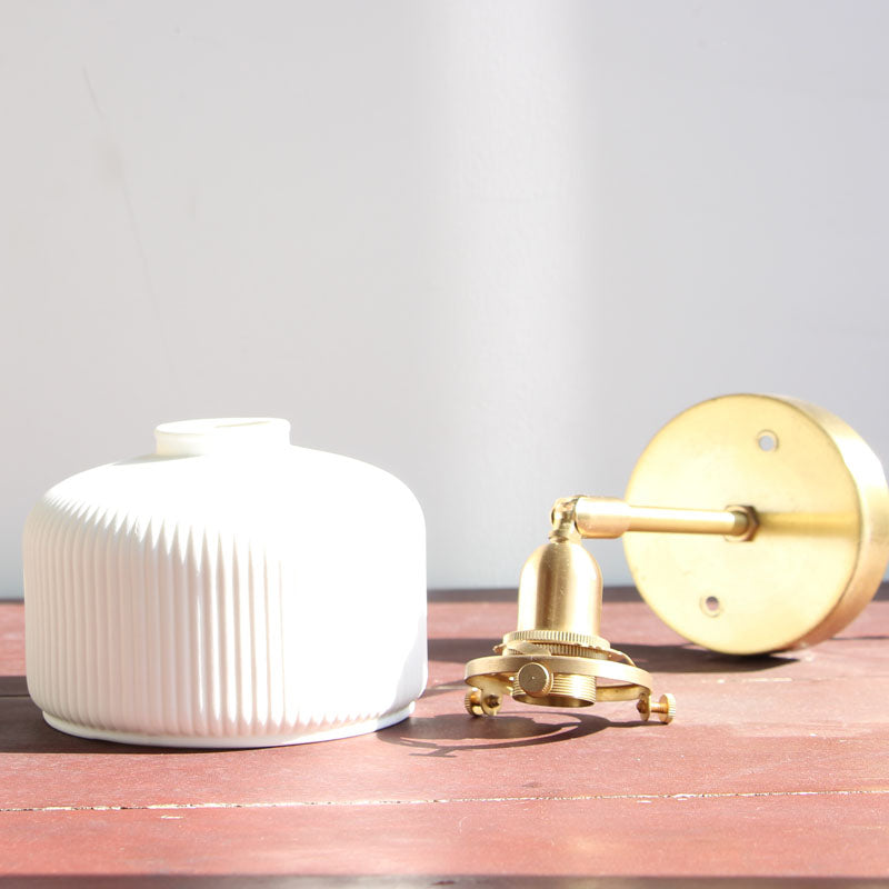 White Ribbed Glass Round Wall Light Simplicity 1 Bulb Foyer Sconce with Pivot Joint in Brass Clearhalo 'Art deco wall lights' 'Cast Iron' 'Glass' 'Industrial wall lights' 'Industrial' 'Middle century wall lights' 'Modern' 'Rustic wall lights' 'Tiffany' 'Traditional wall lights' 'Wall Lamps & Sconces' 'Wall Lights' Lighting' 2465476