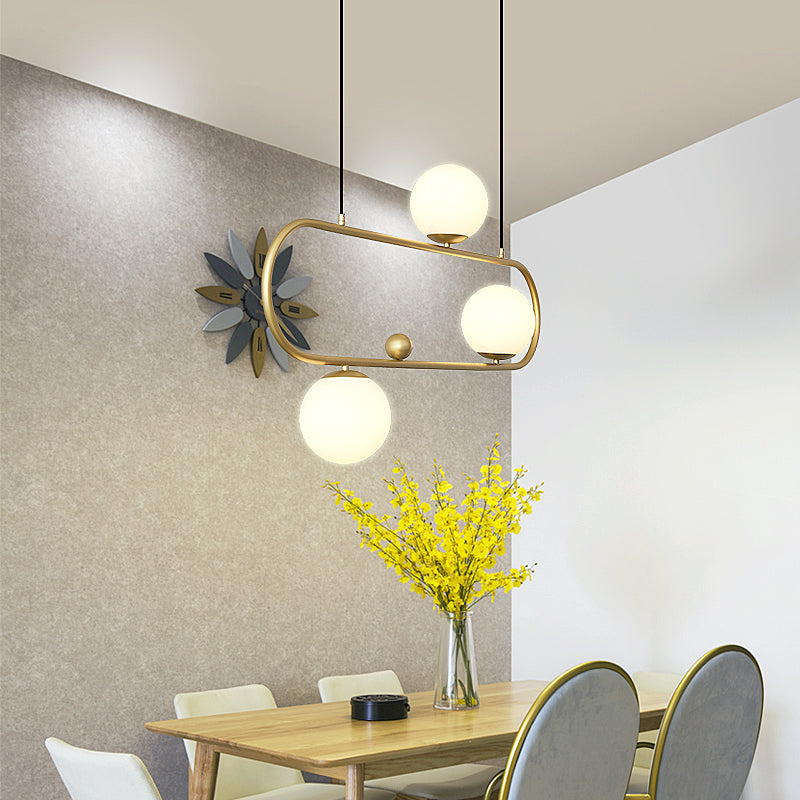 Metal Oblong Island Light Fixture Minimalist Suspension Lighting with Ball Milk Glass Shade 3 Gold Clearhalo 'Ceiling Lights' 'Island Lights' Lighting' 2466730