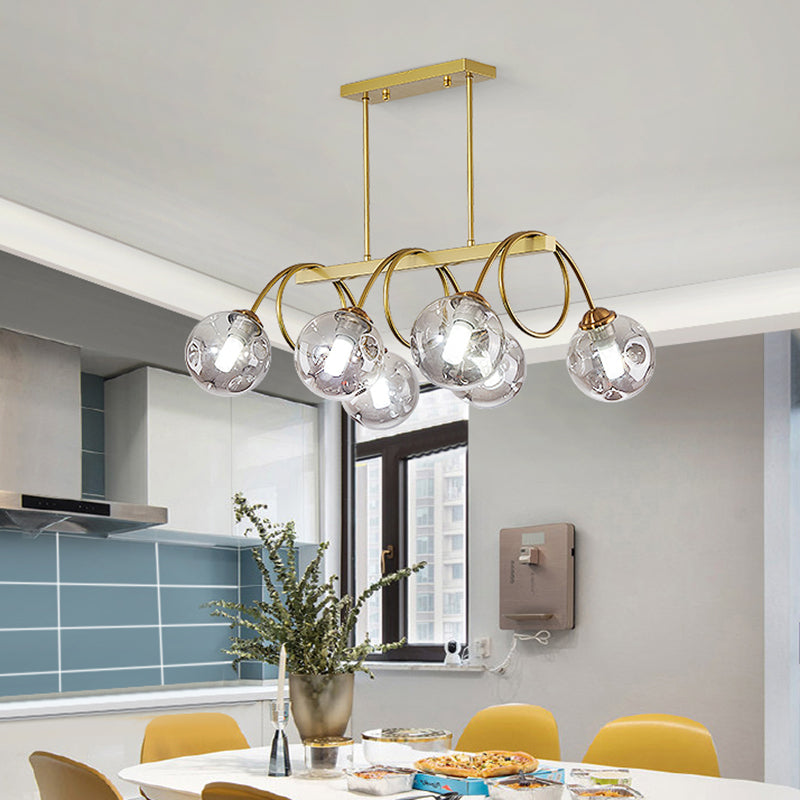 Gold Finish Spiral Island Light Post-Modern Metal Ceiling Hang Lamp with Ball Dimpled Glass Shade 6 Gold Smoke Grey Clearhalo 'Ceiling Lights' 'Island Lights' Lighting' 2468067