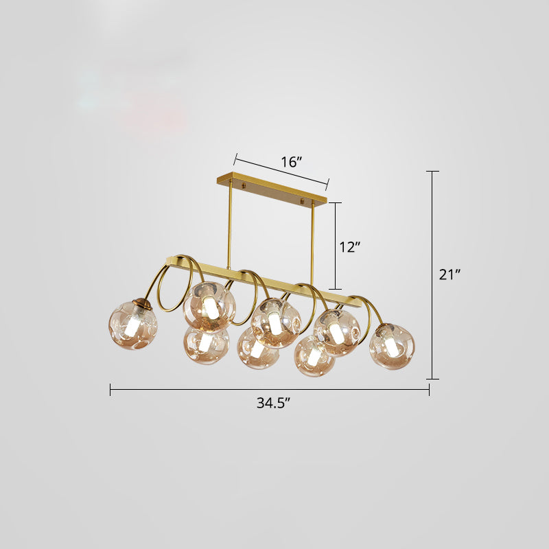 Gold Finish Spiral Island Light Post-Modern Metal Ceiling Hang Lamp with Ball Dimpled Glass Shade Clearhalo 'Ceiling Lights' 'Island Lights' Lighting' 2468071