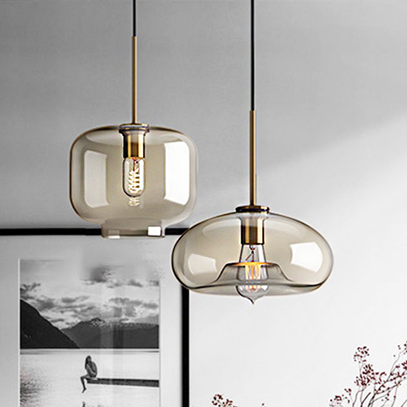 1 Light Dining Room Suspension Lamp with Oval/Drum/Cylinder Clear Glass Shade Contemporary Brass Ceiling Pendant Light, 7"/10"/11" Wide Clearhalo 'Ceiling Lights' 'Glass shade' 'Glass' 'Modern Pendants' 'Modern' 'Pendant Lights' 'Pendants' Lighting' 247071