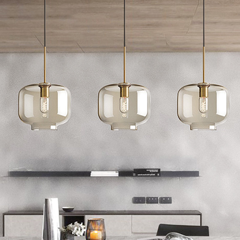 1 Light Dining Room Suspension Lamp with Oval/Drum/Cylinder Clear Glass Shade Contemporary Brass Ceiling Pendant Light, 7"/10"/11" Wide Clearhalo 'Ceiling Lights' 'Glass shade' 'Glass' 'Modern Pendants' 'Modern' 'Pendant Lights' 'Pendants' Lighting' 247075