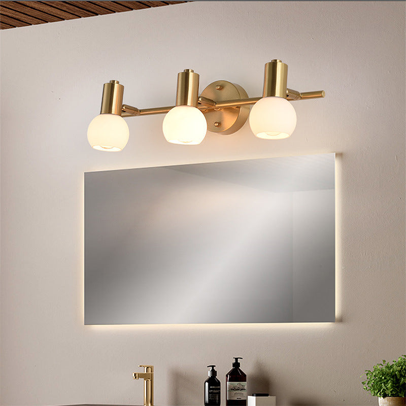 2/3 Bulbs Wall Sconce Lighting with Bubble Shade Milky Glass Modern Bedroom Light Fixture in Brass 3.0 Brass Clearhalo 'Cast Iron' 'Glass' 'Industrial' 'Modern wall lights' 'Modern' 'Tiffany' 'Traditional wall lights' 'Wall Lamps & Sconces' 'Wall Lights' Lighting' 2472322