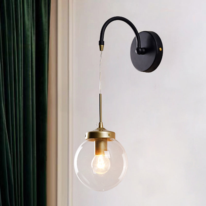 1-Light Clear Glass Wall Sconce Traditional Black Globe Shade Dining Room Sconce Light with Arched Arm Black Clearhalo 'Wall Lamps & Sconces' 'Wall Lights' Lighting' 247249