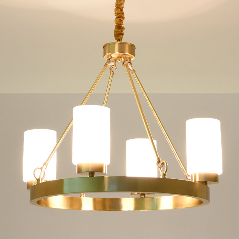 Wagon Wheel Frosted Glass Chandelier Light Classic 4/6 Lights Bedroom Pendant Lighting in Gold with Cylinder Shade 4 Gold Clearhalo 'Ceiling Lights' 'Chandeliers' Lighting' options 247620_444d6123-563e-45d5-a5a7-a2fcfe914a87