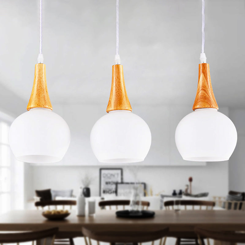 3 Heads Global Pendant Lamp Modernist White Glass and Wood Ceiling Light Fixture for Dining Table White Clearhalo 'Ceiling Lights' 'Close To Ceiling Lights' 'Glass shade' 'Glass' 'Modern Pendants' 'Modern' 'Pendant Lights' 'Pendants' Lighting' 249548