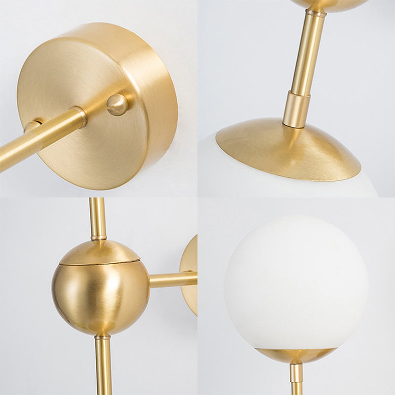 Modern Globe Wall Lighting Fixture 1 Bulb White Glass Sconce Light in Brass for Bathroom Clearhalo 'Cast Iron' 'Glass' 'Industrial' 'Modern wall lights' 'Modern' 'Tiffany' 'Traditional wall lights' 'Wall Lamps & Sconces' 'Wall Lights' Lighting' 250623