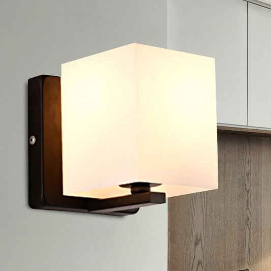 White Shade Sconce Light with Black Base 1 Light Modern Style Milk Glass Wall Sconce for Living Room Black A Clearhalo 'Cast Iron' 'Glass' 'Industrial' 'Modern wall lights' 'Modern' 'Tiffany' 'Traditional wall lights' 'Wall Lamps & Sconces' 'Wall Lights' Lighting' 253018