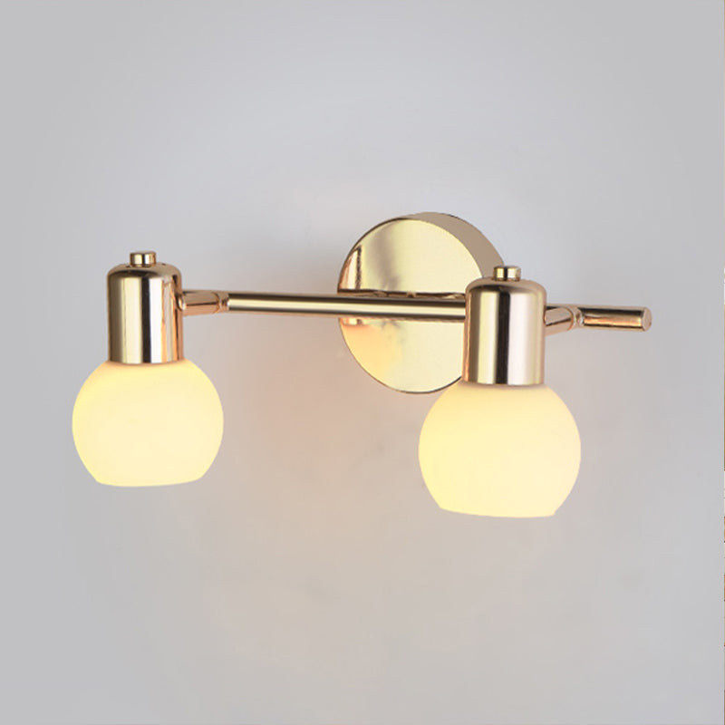 2/3 Bulbs Wall Sconce Lighting with Bubble Shade Milky Glass Modern Bedroom Light Fixture in Brass 2.0 Brass Clearhalo 'Cast Iron' 'Glass' 'Industrial' 'Modern wall lights' 'Modern' 'Tiffany' 'Traditional wall lights' 'Wall Lamps & Sconces' 'Wall Lights' Lighting' 253146