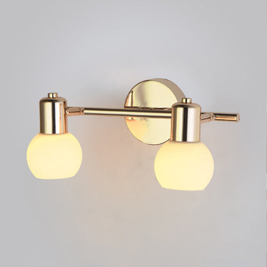2/3 Bulbs Wall Sconce Lighting with Bubble Shade Milky Glass Modern Bedroom Light Fixture in Brass 2.0 Brass Clearhalo 'Cast Iron' 'Glass' 'Industrial' 'Modern wall lights' 'Modern' 'Tiffany' 'Traditional wall lights' 'Wall Lamps & Sconces' 'Wall Lights' Lighting' 253146