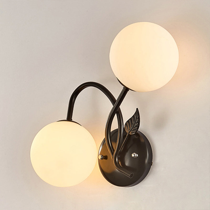 Double Globe Opal Glass Wall Light Modern 2-Bulb Coffee Shop Sconce Lamp in Black/Gold Clearhalo 'Cast Iron' 'Glass' 'Industrial' 'Modern wall lights' 'Modern' 'Tiffany' 'Traditional wall lights' 'Wall Lamps & Sconces' 'Wall Lights' Lighting' 253171