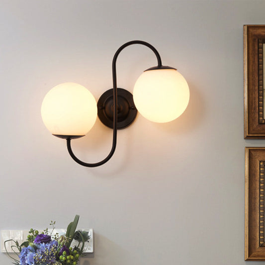 2-Light Round Sconce Light Fixture Modern Black White Glass Wall Lamp for Living Room White Clearhalo 'Cast Iron' 'Glass' 'Industrial' 'Modern wall lights' 'Modern' 'Tiffany' 'Traditional wall lights' 'Wall Lamps & Sconces' 'Wall Lights' Lighting' 253332