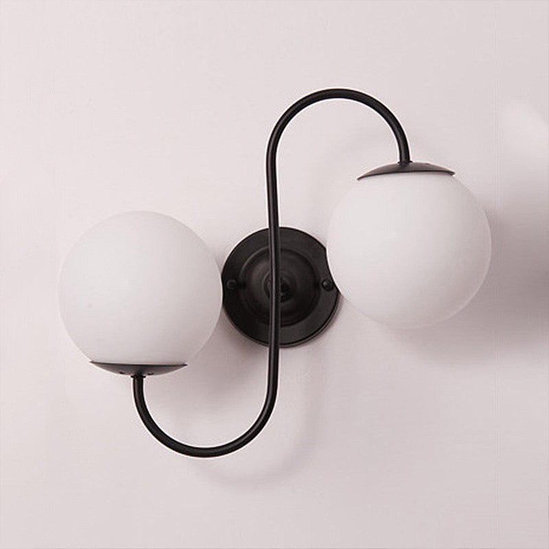 2-Light Round Sconce Light Fixture Modern Black White Glass Wall Lamp for Living Room Clearhalo 'Cast Iron' 'Glass' 'Industrial' 'Modern wall lights' 'Modern' 'Tiffany' 'Traditional wall lights' 'Wall Lamps & Sconces' 'Wall Lights' Lighting' 253334