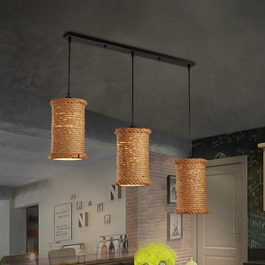 Cylindrical Dining Room Ceiling Hanging Light Country Rope 3 Lights Beige Pendant Lamp with Adjustable Cord Beige Clearhalo 'Ceiling Lights' 'Industrial Pendants' 'Industrial' 'Middle Century Pendants' 'Pendant Lights' 'Pendants' 'Tiffany' Lighting' 253621