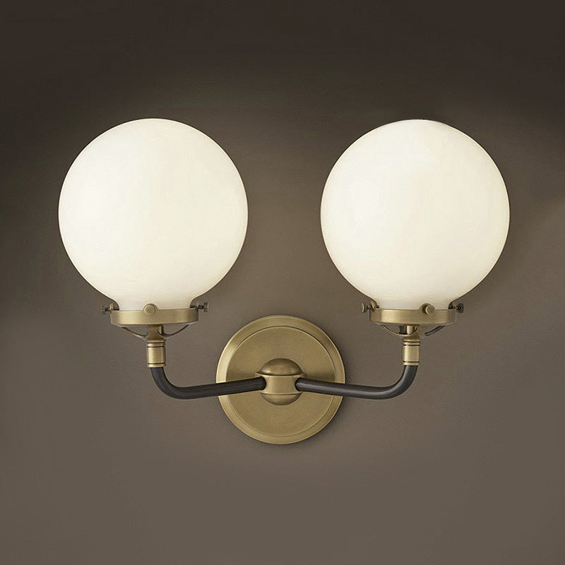 Modern Globe Shade Wall Lighting Fixture 1/2-Bulb Opal Glass Sconce Light in Antique Brass/Chrome 2.0 Antique Brass Clearhalo 'Cast Iron' 'Glass' 'Industrial wall lights' 'Industrial' 'Middle century wall lights' 'Modern' 'Tiffany' 'Traditional wall lights' 'Wall Lamps & Sconces' 'Wall Lights' Lighting' 253729