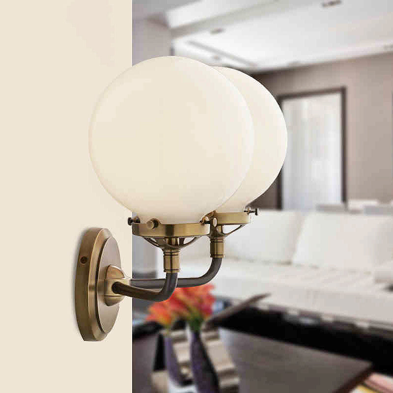 Modern Globe Shade Wall Lighting Fixture 1/2-Bulb Opal Glass Sconce Light in Antique Brass/Chrome Clearhalo 'Cast Iron' 'Glass' 'Industrial wall lights' 'Industrial' 'Middle century wall lights' 'Modern' 'Tiffany' 'Traditional wall lights' 'Wall Lamps & Sconces' 'Wall Lights' Lighting' 253730