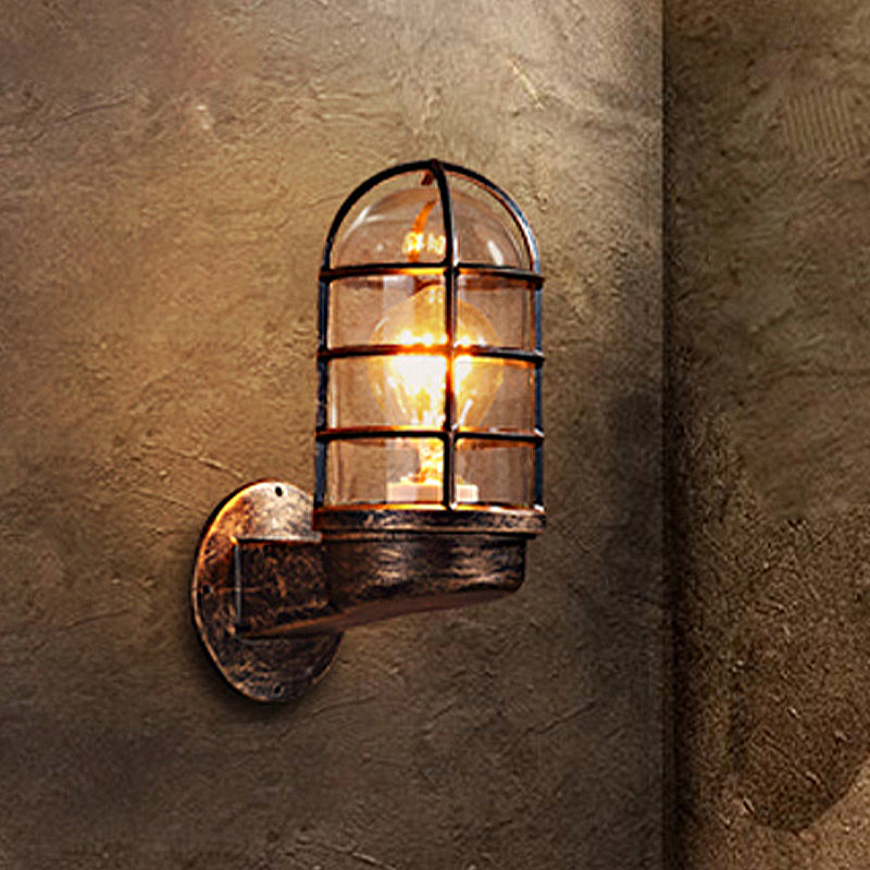 Cylinder Clear Glass Wall Mounted Lamp Industrial Single Bulb Living Room Sconce Light in Pink/Blue/Green with Cage Antique Brass Clearhalo 'Cast Iron' 'Glass' 'Industrial' 'Modern wall lights' 'Modern' 'Tiffany' 'Traditional wall lights' 'Wall Lamps & Sconces' 'Wall Lights' Lighting' 253782