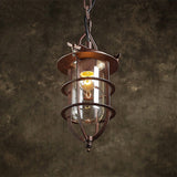 Rust Caged Lantern Pendant Fixture Coastal Clear Glass Single-Bulb Living Room Hanging Ceiling Light Clearhalo 'Ceiling Lights' 'Close To Ceiling Lights' 'Glass shade' 'Glass' 'Industrial Pendants' 'Industrial' 'Middle Century Pendants' 'Pendant Lights' 'Pendants' 'Tiffany' Lighting' 254132