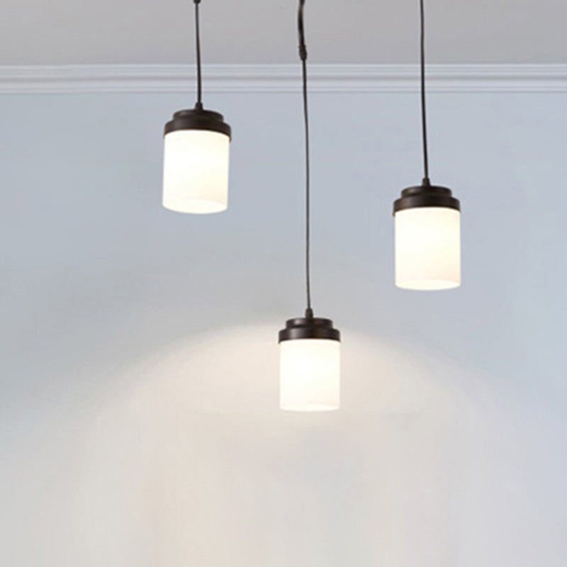 Cylinder Shade Hanging Light Contemporary Frosted Glass Pendant Lamp in Black & White for Kitchen 3 Black Clearhalo 'Ceiling Lights' 'Chandeliers' 'Modern Chandeliers' 'Modern' Lighting' 254285