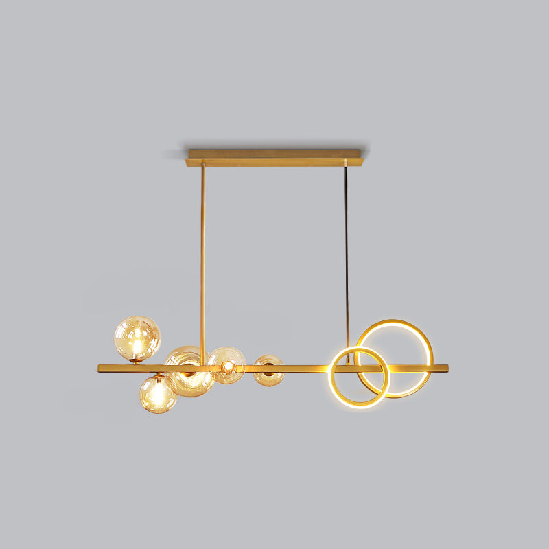 Ring and Globe Island Lamp Contemporary Glass 7-Head Hanging Light for Dining Room Gold Cognac Warm Clearhalo 'Ceiling Lights' 'Glass shade' 'Glass' 'Island Lights' Lighting' 2546490