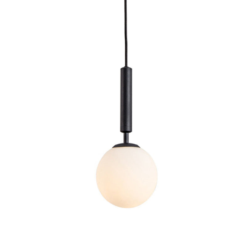 Globe Hanging Ceiling Light Modern White Glass Pendant Lamp for Bedroom Black 6" Clearhalo 'Ceiling Lights' 'Glass shade' 'Glass' 'Modern Pendants' 'Modern' 'Pendant Lights' 'Pendants' Lighting' 2548905