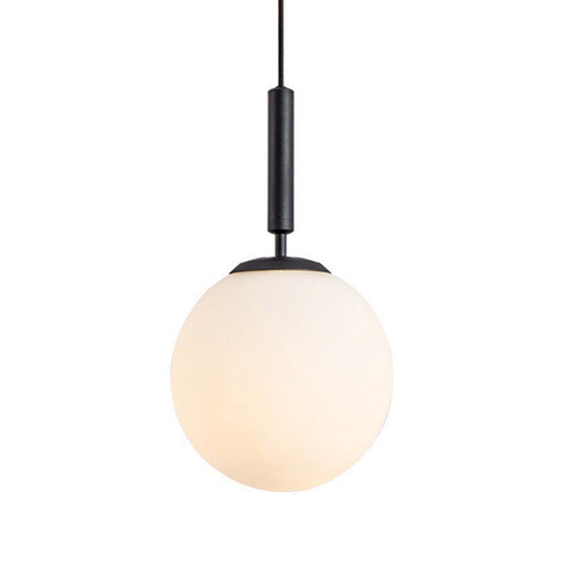 Globe Hanging Ceiling Light Modern White Glass Pendant Lamp for Bedroom Black 10" Clearhalo 'Ceiling Lights' 'Glass shade' 'Glass' 'Modern Pendants' 'Modern' 'Pendant Lights' 'Pendants' Lighting' 2548908