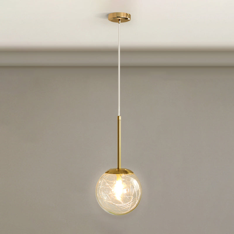 Spherical Glass Hanging Ceiling Light Modern 1 Light Bedroom Pendant Lamp in Gold Gold 6" Linear Clearhalo 'Ceiling Lights' 'Glass shade' 'Glass' 'Modern Pendants' 'Modern' 'Pendant Lights' 'Pendants' Lighting' 2548935