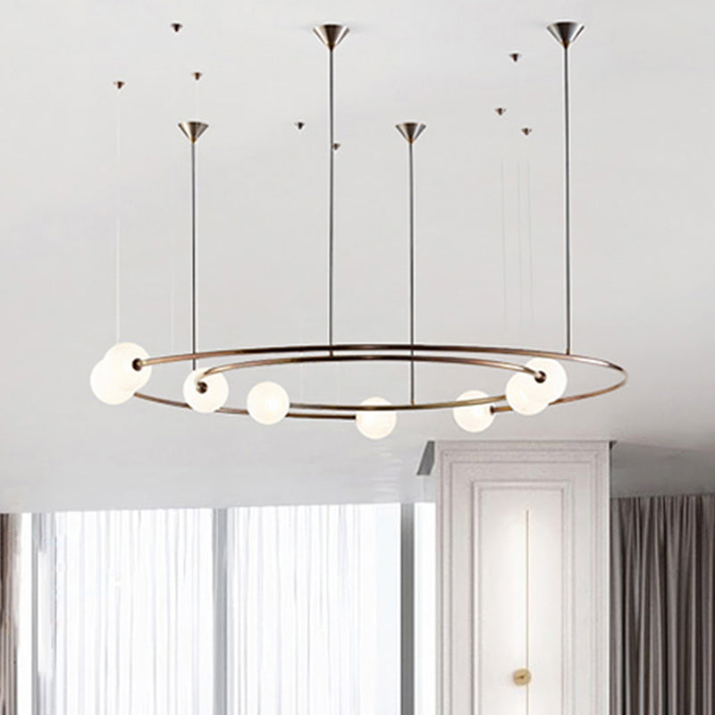 Metallic Universe Chandelier with Orb Shade Living Room 8 Lights Modern Pendant Light in Aged Brass Clearhalo 'Ceiling Lights' 'Chandeliers' 'Modern Chandeliers' 'Modern' Lighting' 255047