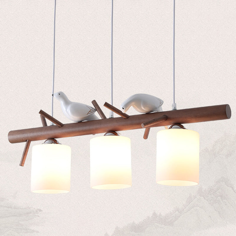 3 Lights Nutcracker Wood Island Pendant Lighting Contemporary Cylindrical Glass Shade Island Lamps Clearhalo 'Ceiling Lights' 'Island Lights' Lighting' 2557064