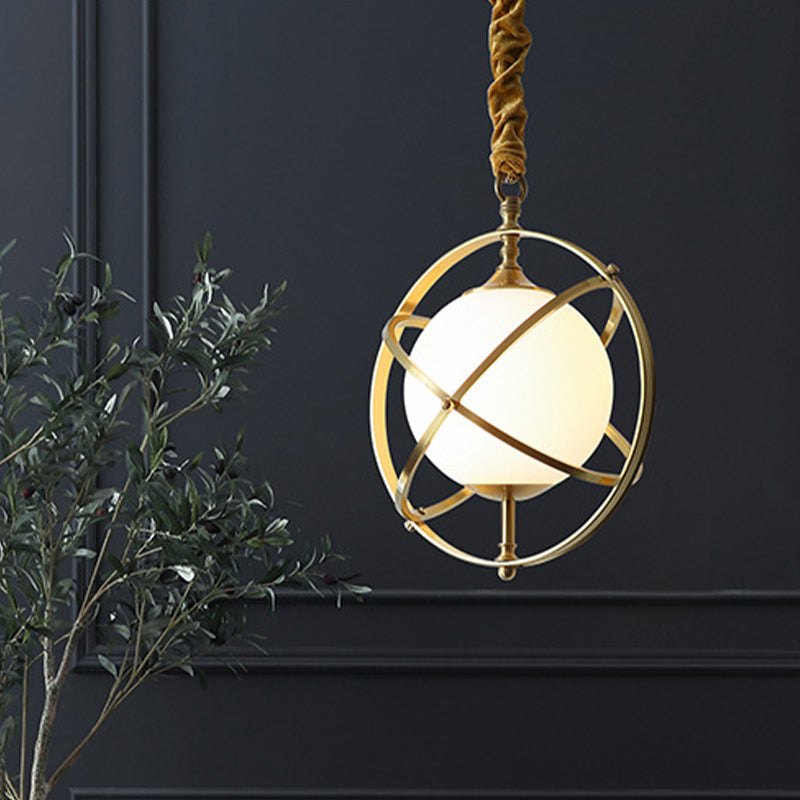 Brass Orbit Pendant Lighting Fixture Postmodern 1 Head Metal Hanging Light with White Glass Shade Clearhalo 'Ceiling Lights' 'Glass shade' 'Glass' 'Modern Pendants' 'Modern' 'Pendant Lights' 'Pendants' Lighting' 257111