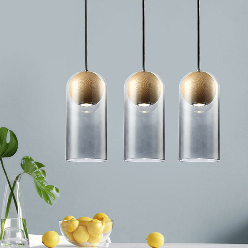 Cylinder Pendant Light Fixture Modern Smoke Gray Glass Dining Room Hanging Light with Globe Wood Shade Inside Clearhalo 'Ceiling Lights' 'Glass shade' 'Glass' 'Modern Pendants' 'Modern' 'Pendant Lights' 'Pendants' Lighting' 257222