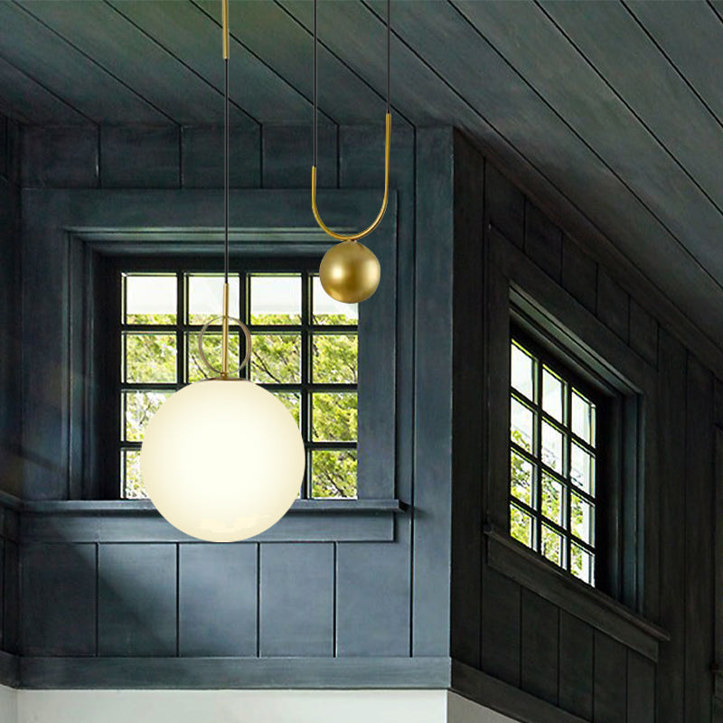 Sphere Pendant Light Modern White Glass 1 Head Bedroom Hanging Light Fixture in Gold Clearhalo 'Ceiling Lights' 'Glass shade' 'Glass' 'Modern Pendants' 'Modern' 'Pendant Lights' 'Pendants' Lighting' 257567