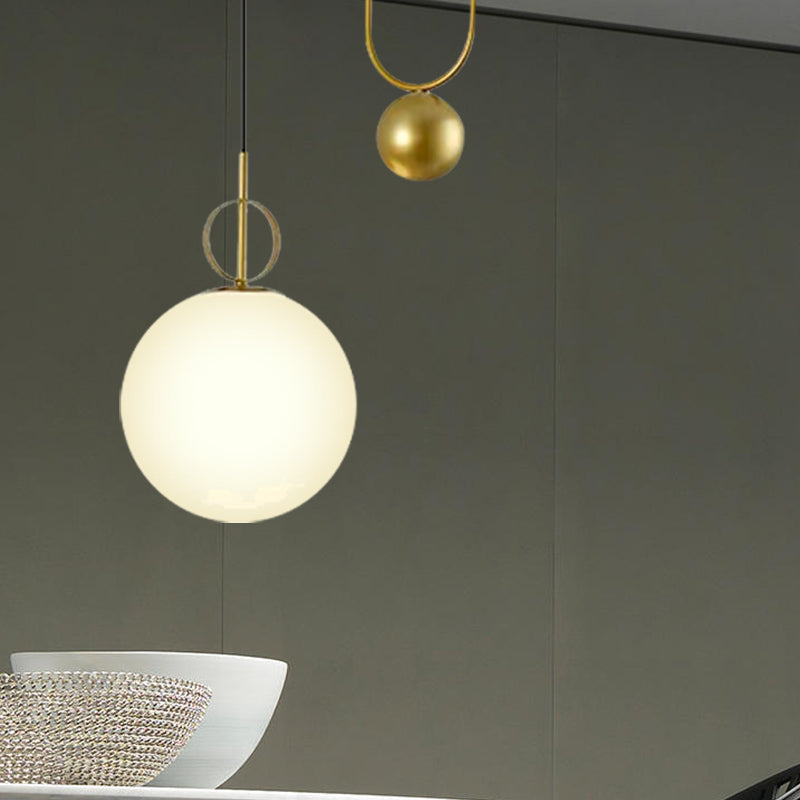 Sphere Pendant Light Modern White Glass 1 Head Bedroom Hanging Light Fixture in Gold Clearhalo 'Ceiling Lights' 'Glass shade' 'Glass' 'Modern Pendants' 'Modern' 'Pendant Lights' 'Pendants' Lighting' 257568