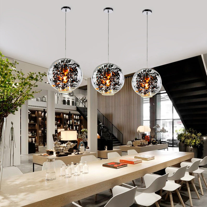 Clear Glass Sphere Pendant Ceiling Light Modern 1 Head Hanging Lamp with Black Plant Design Inside Clearhalo 'Ceiling Lights' 'Glass shade' 'Glass' 'Modern Pendants' 'Modern' 'Pendant Lights' 'Pendants' Lighting' 257595