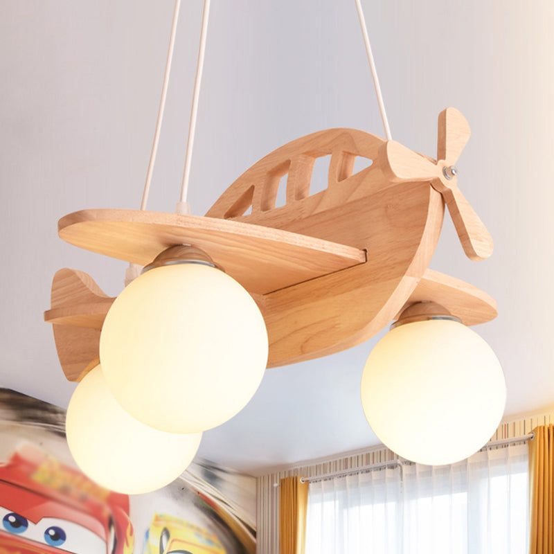 3 Lights Airplane Pendant Light Fixture Cartoon Wooden Suspension Pendant Light with Ball White Glass Shade Clearhalo 'Ceiling Lights' 'Pendant Lights' 'Pendants' Lighting' 2579027