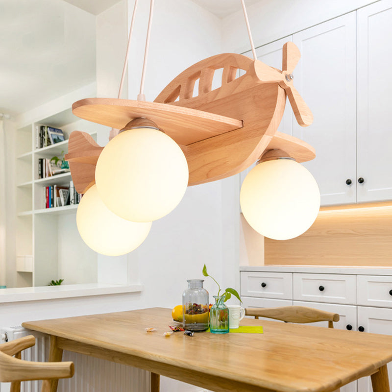 3 Lights Airplane Pendant Light Fixture Cartoon Wooden Suspension Pendant Light with Ball White Glass Shade Clearhalo 'Ceiling Lights' 'Pendant Lights' 'Pendants' Lighting' 2579029